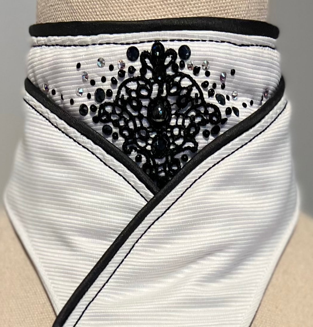A stylish Crossover Stock with Black piping and a lace insert piece feature at the neck.#5